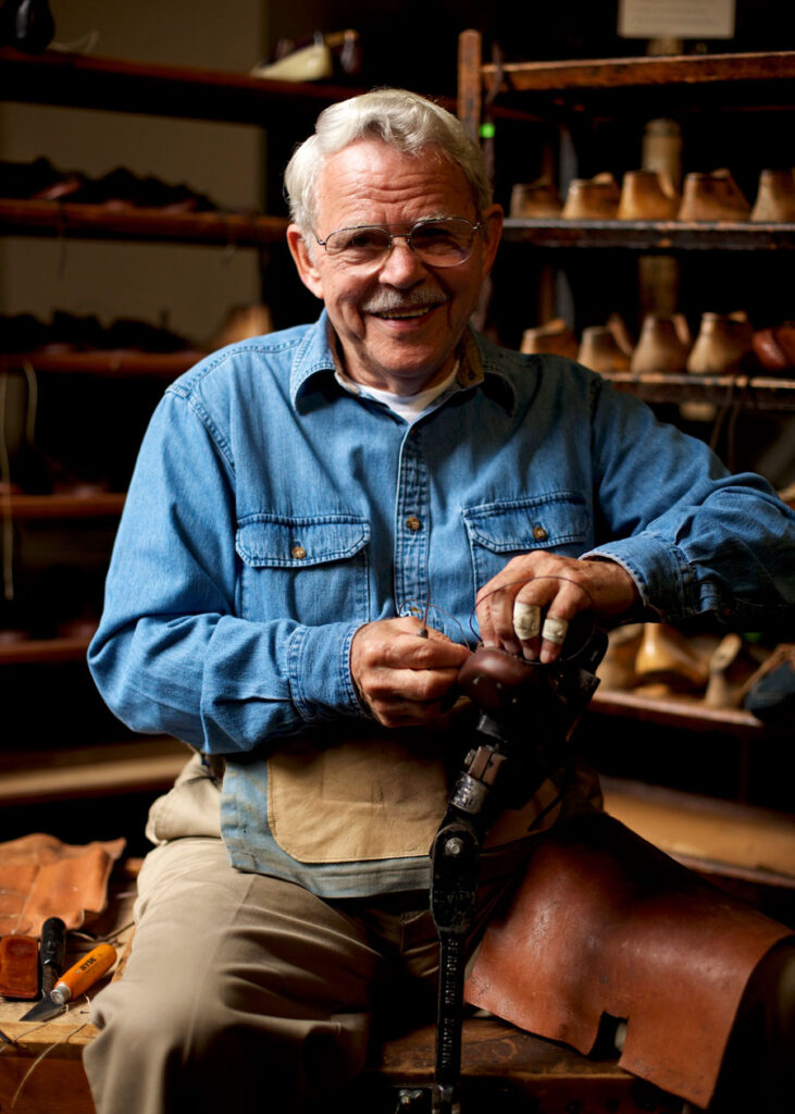 A shoe maker in his workshop